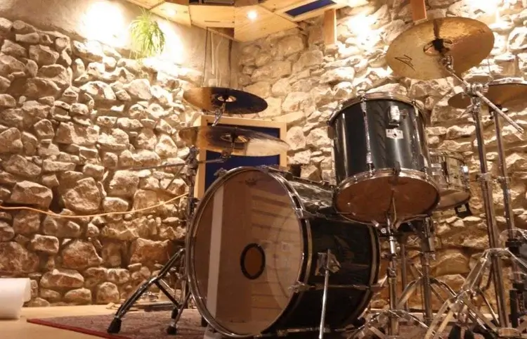 Close up of dark blue drum kit